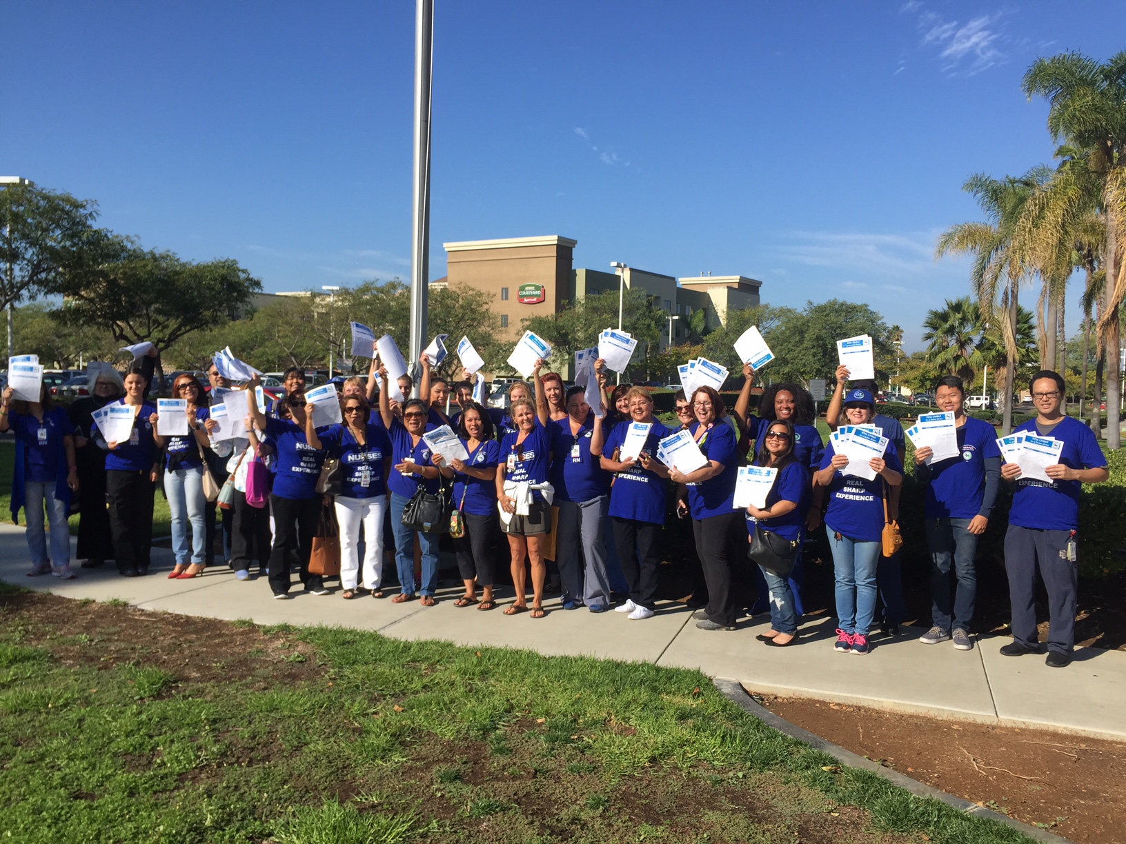 RN Delegation Delivers Thousands of Petition Signatures to Sharp Management - UNAC/UHCP